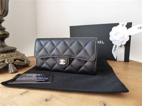 chanel classic quilted medium flap wallet black caviar|Classic small flap wallet .